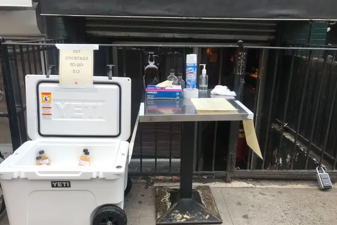 To-go-cocktails being sold on the sidewalk in 2020.